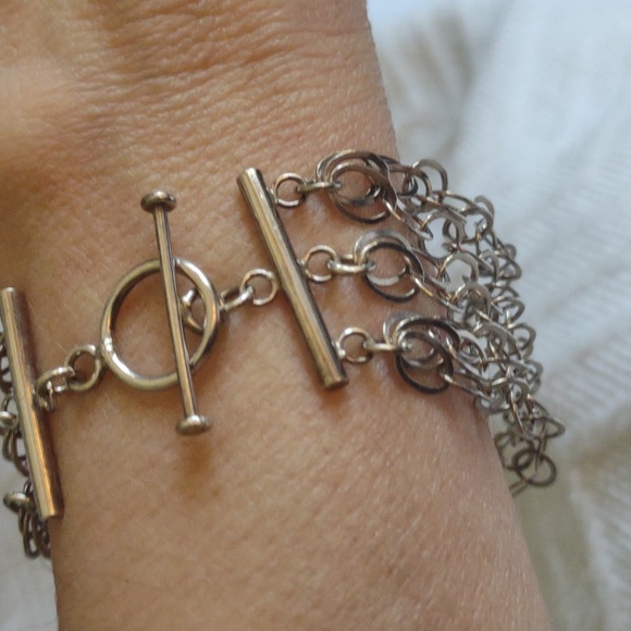 Jewelry - Sterling Silver 8 Row Multi Strand Oval Links Bracelet. 7 inches in length. EC.